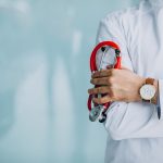 www.znewsservice.com study americans fear cancer the most yet half take no preventive measures young handsome physician medical robe with stethoscope